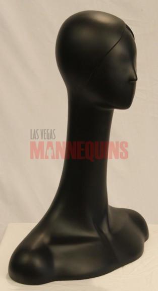 Female mannequin head in black pvc